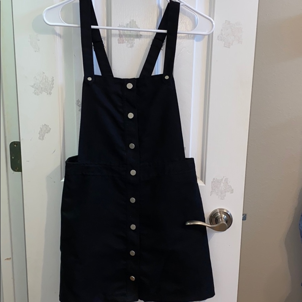 Black dress overalls.